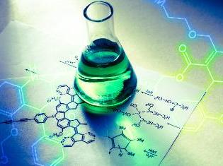 A beaker sitting on top of notes with a molecular diagram.