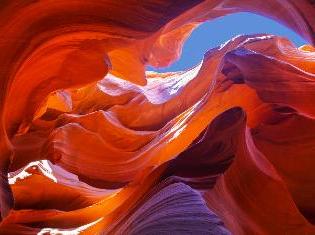 Upward view inside a rock formation.